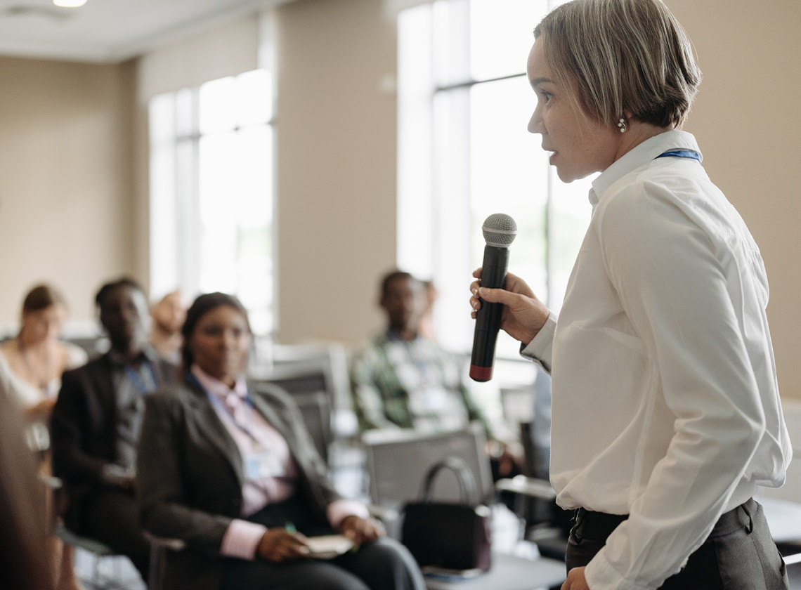 MPH graduate speaking to group